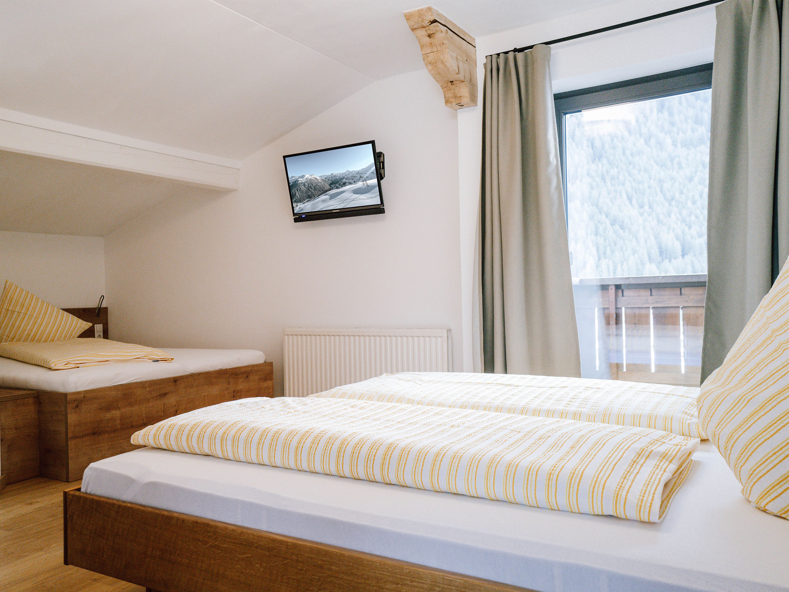 Spatla_Appartements_Vallüla_Schlafen_im_2_Zimmer